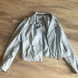 Light blue leather jacket DOMA great condition xl but is cropped so it fits long